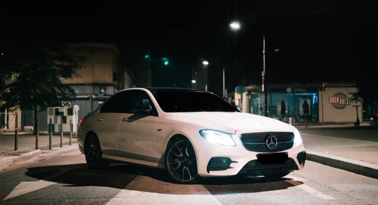 white mercedes benz coupe on road during night time